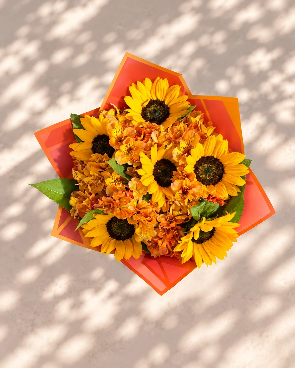 Girasoles con astromelias naranja